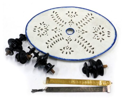 A 19thC pearlware drainer, a white coloured metal bracelet, a gold coloured metal bracelet, and various Vienna wall clock fin