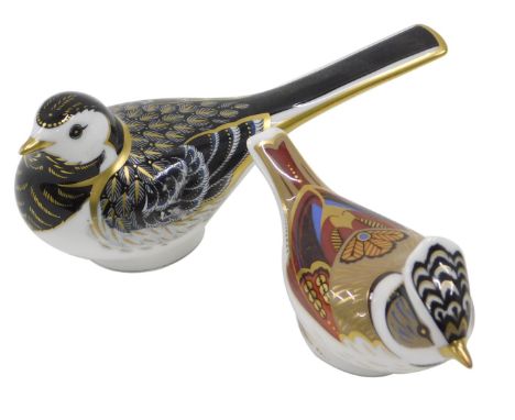 Two Royal Crown Derby porcelain birds, to include Pied Wagtail, the other bird with a faceted gold button.