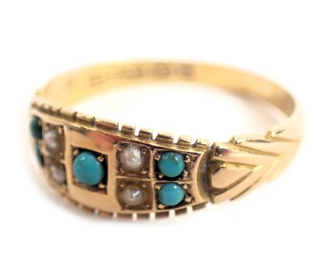 An Edwardian 15ct gold dress ring, set with arrangement of seed pearls and turquoise, ring size P, 2.6g all in. 