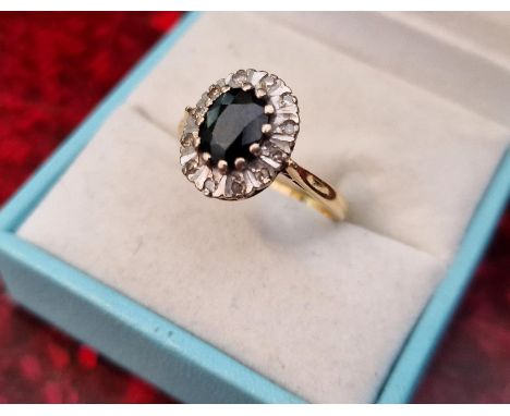 18ct Gold, Diamonds and Black Onyx Ring, size Q and 4.36g