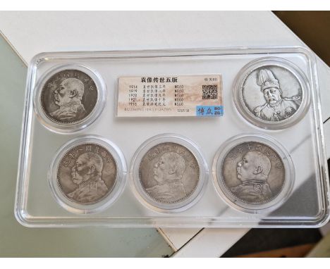 Sealed Collection of Four Chinese Silver Coins