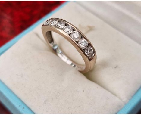 18ct White Gold and 7-Diamond Half Band Ring, size M+0.5 and 3.73g