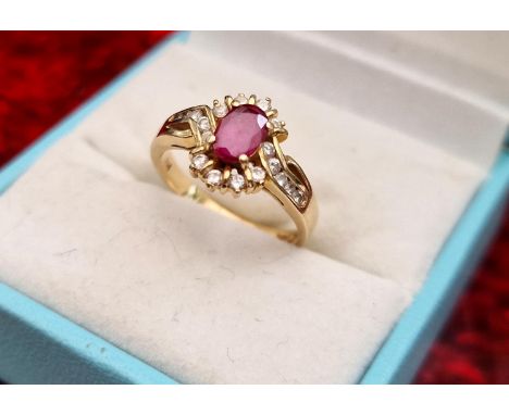 18ct Gold, Ruby and Diamond Ring, size K+0.5 and 3.49g