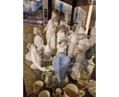 Group of Nine Nao/Lladro Figures