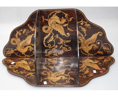 A late 19th century 'penwork' two tier corner shelf with gryphon decoration, 78 x 40cm