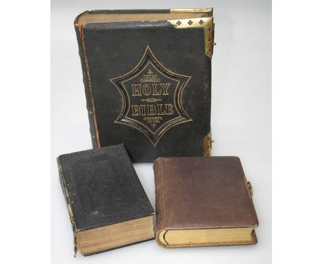 The Illustrated National Family Bible, leather bound with brass mounts, an 1849 Holy Bible and an Edwardian studio portrait p