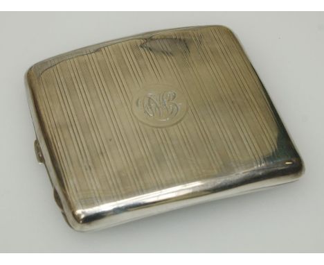 H Matthews, a silver cigarette case with monogrammed cartouche and engine turned decoration, Birmingham 1922