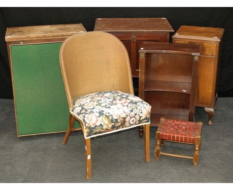 A 1920's oak radio cabinet, with panelled fall front on barley twist and block supports, a baize top folding card table, an o