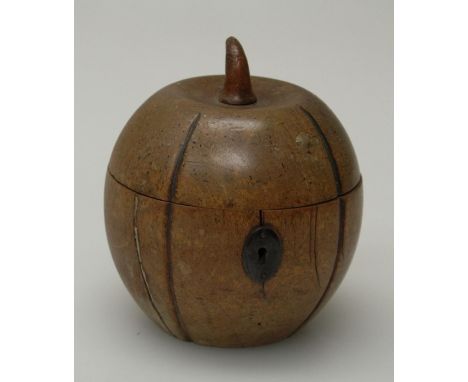 A Regency fruitwood melon form tea caddy with iron lock, traces of zinc lining,13cm highTwo full length cracks to bottom sect