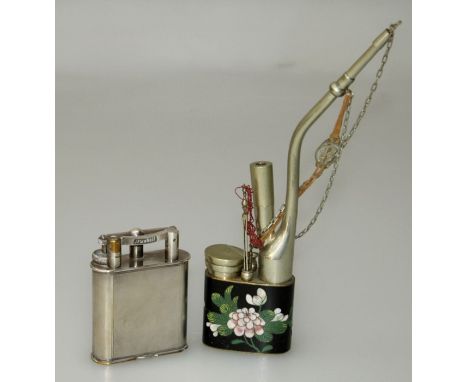 A Dunhill table lighter with engine turned decoration, 10.5cm together with a mid 20th century cloisonné opium pipe&nbsp;