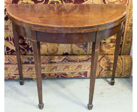 DEMI-LUNE CARD TABLE, George III mahogany and tulipwood banded with green baize hinged top, 91cm W x 96cm x 45cm D. (with fau