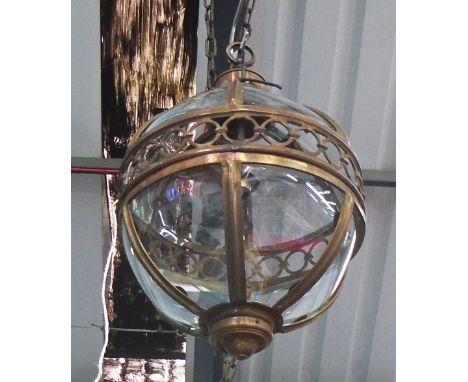 HANGING LAMP, globe style in a bronzed frame, 41cm diam. plus chain.