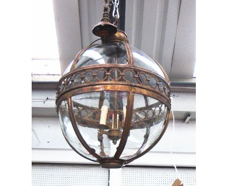 HANGING LAMP, globe style in a bronzed frame, 51cm diam. plus chain.