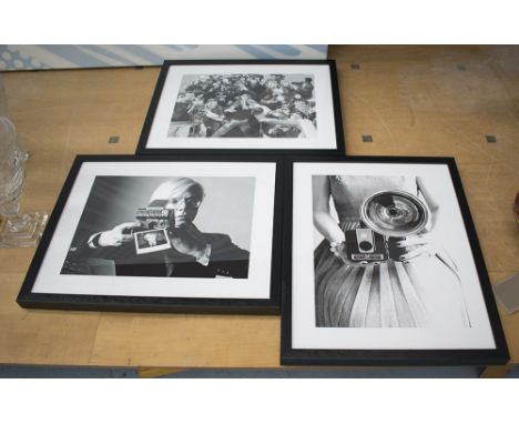 BLACK AND WHITE CAMERA PICTURES, a set of three, one being Andy Warhol, 50cm x 40cm, framed and glazed. (3)