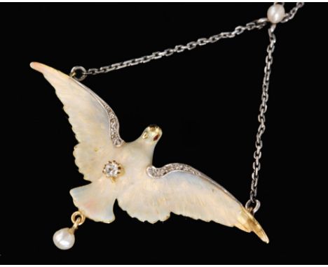 An Art Nouveau 18ct pendant modelled as a Dove of Venus with iridescent enamel decorated to outstretched wings, central singl