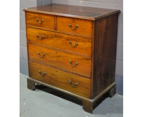 A George III mahogany straight front chest of two short and three long drawers, brass drop handles on bracket feet, width 101