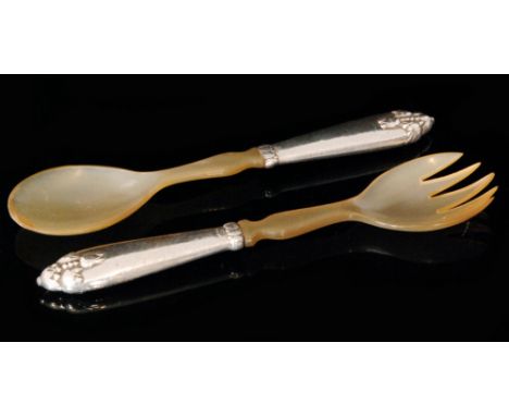 A pair of Danish Sterling silver salad servers, each with stylised tulip decoration and horn spoon and fork blades, stamped 9