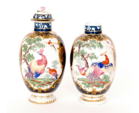 A pair of 19th Century vases each decorated with cartouche panels with exotic birds within a landscape setting framed within 