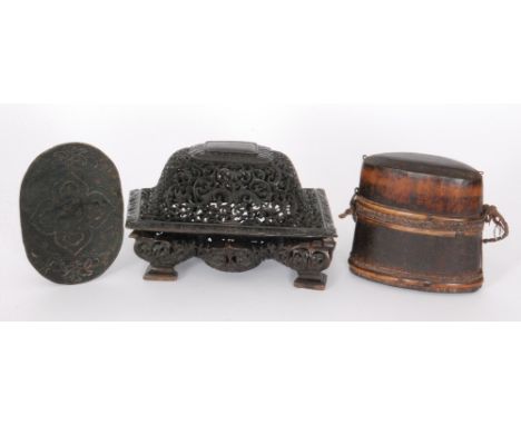 A late 19th Century Chinese carved hardwood domed rectangular container and cover scroll foliate style together with a wooden