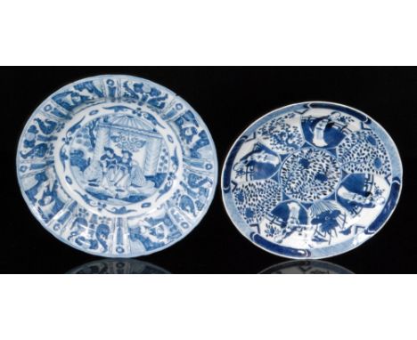 Two 19th Century Chinese blue and white chargers, the first decorated to the well with hand painted figures in a garden setti