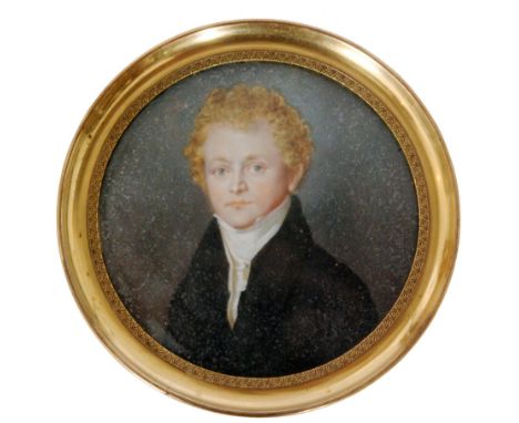 An early 19th Century miniature portrait of a young Georgian gentleman wearing a black coak and white ruff, unsigned and unna