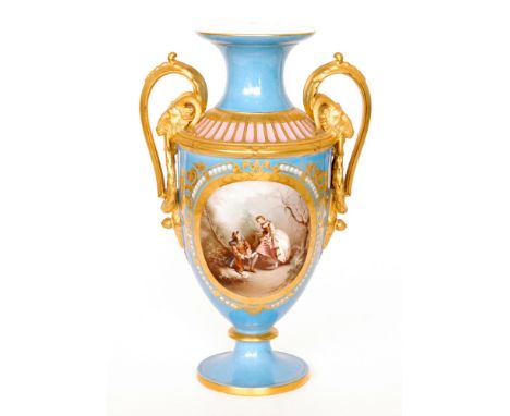 A large 19th Century twin handled vase, in the manner of Sevres, the body decorated with hand painted roundels with a Watteau