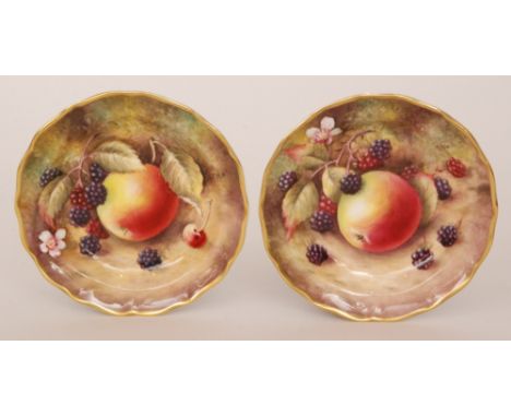 Two hand painted pin dishes decorated by former Royal Worcester artist T. Nutt, each decorated with hand painted apples and b