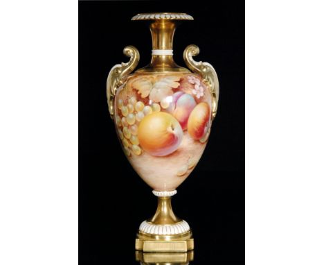 A Royal Worcester Fallen Fruits twin handled pedestal vase decorated in the round by P. English with hand painted peaches, ap
