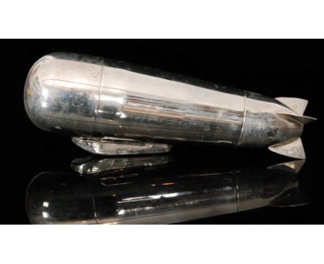 An Art Deco electro plated cocktail shaker in the form of a Zeppelin to a German design by A.J.A Henckels, the detachable tai