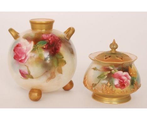 A Royal Worcester twin handled posy vase of ovoid from raised to three bun feet, the body decorated with hand painted crimson