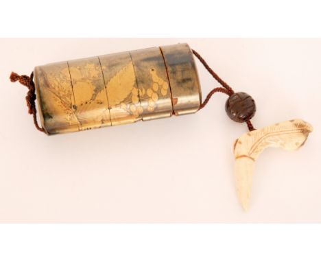 A 19th Century Japanese lacquered and painted four section inro decorated with leaf and fern design with bone netsuke and red
