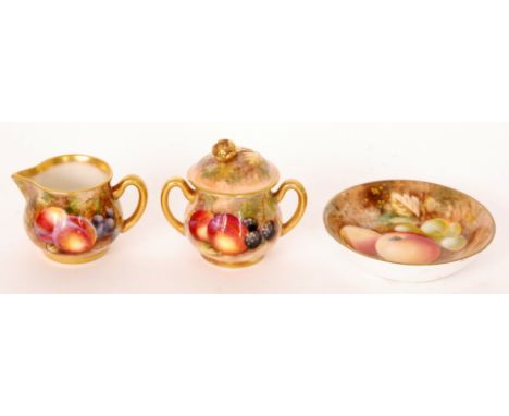 A Royal Worcester Fallen Fruits miniature milk jug decorated by Freeman with hand painted peaches and grapes, signed, black p