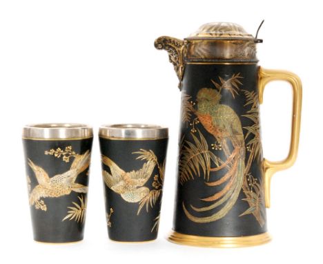 A late 19th Century Royal Worcester Aesthetic lemonade set comprising tall lidded jug and two beakers, the jug decorated with