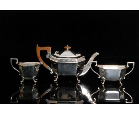 A George VI hallmarked silver three piece tea service comprising of teapot, sugar bowl and milk jug, each of hexagonal outlin