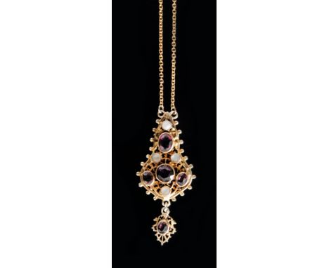 An Arts and Crafts silver gilt pierced pendant set with amethyst and mother of pearl panels, suspended from a fine belcher ch