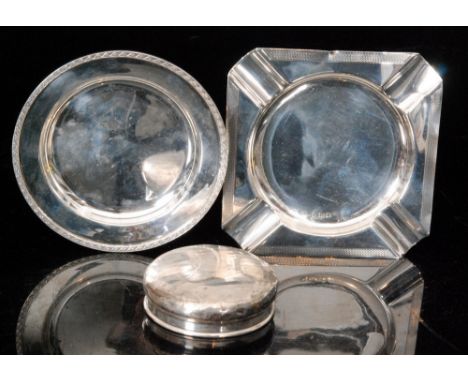 A hallmarked silver circular pin tray with cast Celtic border together with a square engine turned ashtray and a silver toppe