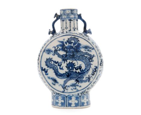 A 19th Century Chinese blue and white porcelain moon flask with Ruyi sceptre handles, the body decorated with a dragon chasin