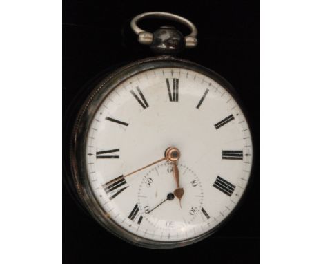 An Edwardian hallmarked silver key wind open faced pocket watch with white enamel dial and Roman numerals, subsidiary seconds