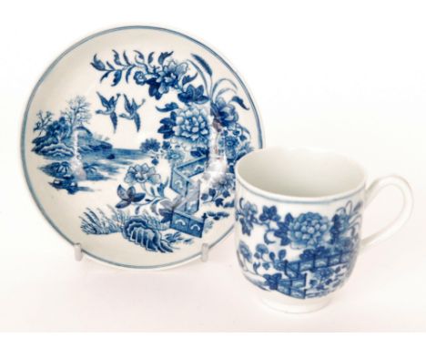 An 18th Century Worcester coffee cup and saucer decorated in the blue and white Fence pattern, both pieces with crescent mark
