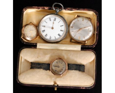 Three various 9ct wrist watches to include a gentleman's Shield 21 jewel manual wind watch, a lady's Primula watch and anothe