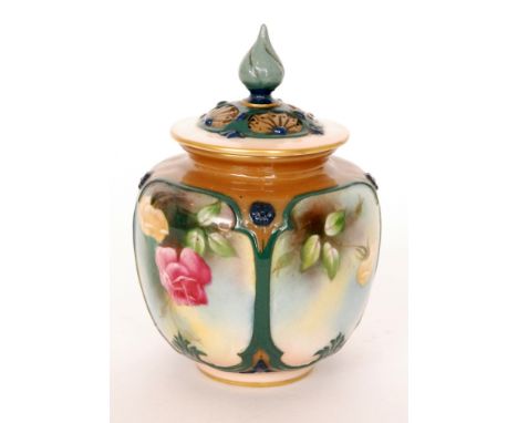 A Royal Worcester pot pourri with spire cover, the lobed body decorated with hand painted pink and yellow roses, with green s