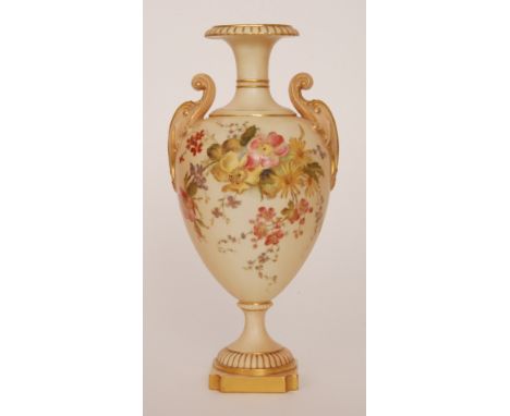 A large Royal Worcester blush ivory shape 1969 twin handled pedestal vase decorated with sprays of flowers and foliage with m