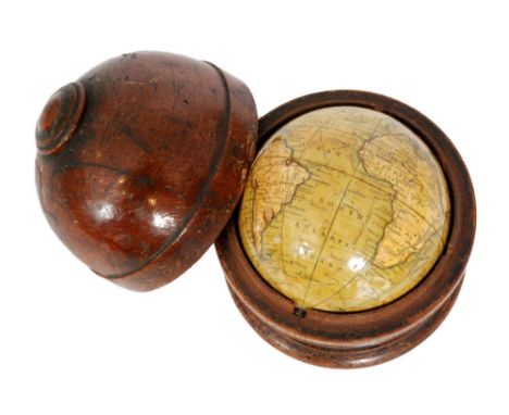 An early 19th Century Newton's of London new and improved terrestial pocket globe, diameter 7cm, in turned mahogany stand wit