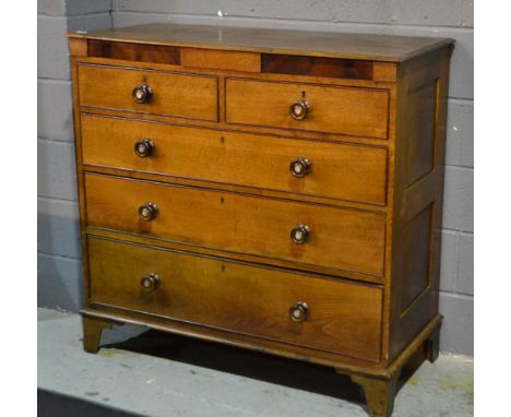 A 19th Century oak chest of two short over three long drawers, with mother of pearl inset mahogany handles over bracket feet,
