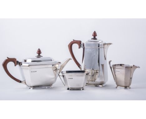 An Art Deco four-piece silver teaset, by Roberts & Belk, Sheffield 1946, of tapering oblong form with canted corners, the tea