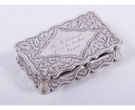 A Victorian silver snuff box, by George Unite, Birmingham 1878, shaped rectangular form, bright-cut decoration, lozenge carto