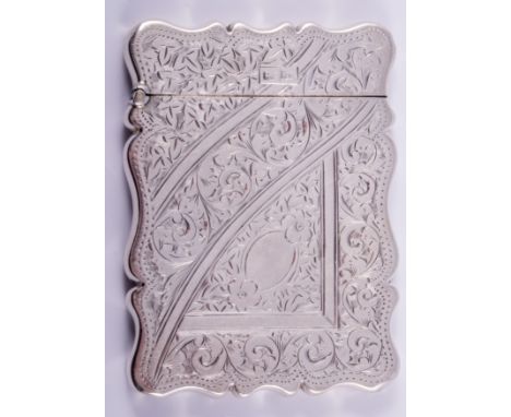 An Edwardian silver visiting card case, by Walker & Hall, Sheffield 1902, serpentine outlines, light-cut engraved decoration,