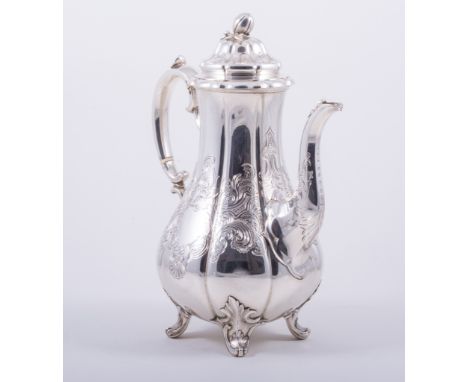 A Victorian silver pear-shaped coffee pot, by E.J.E.W. Barnard, London 1838, lightly lobed form, ogee lid with fruit finial, 