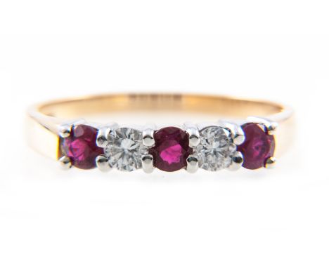 A ruby and diamond half eternity ring, two brilliant cut diamonds and three circular cut rubies, claw set in a an 18 carat ye