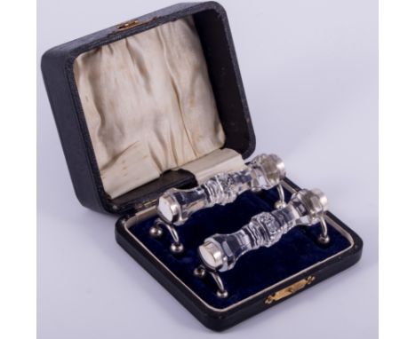 A pair of cut glass and silver mounted knife rests, by William Vale & Sons., Chester 1926, the glass divisions of polygonal s